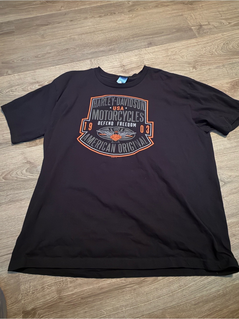 Harley-Davidson Black T-Shirt with Orange and Gray Motorcycle Shield Graphic